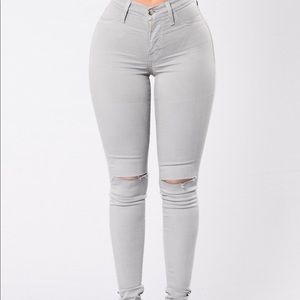 Gray jeans with cut on knees